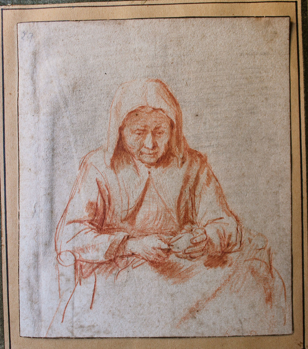 Vieille femme épluchant une pomme. Dessin à la sanguine, 12,5 x 11 cm Annoté « Rembrandt » à la plume au verso.